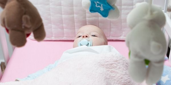 Unlocking Early Growth: How Cot Mobiles Boost Your Baby's Developmental Journey