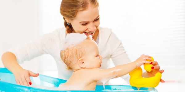The Joyful Splashes of Learning: How Bath Time Play Shapes Your Child
